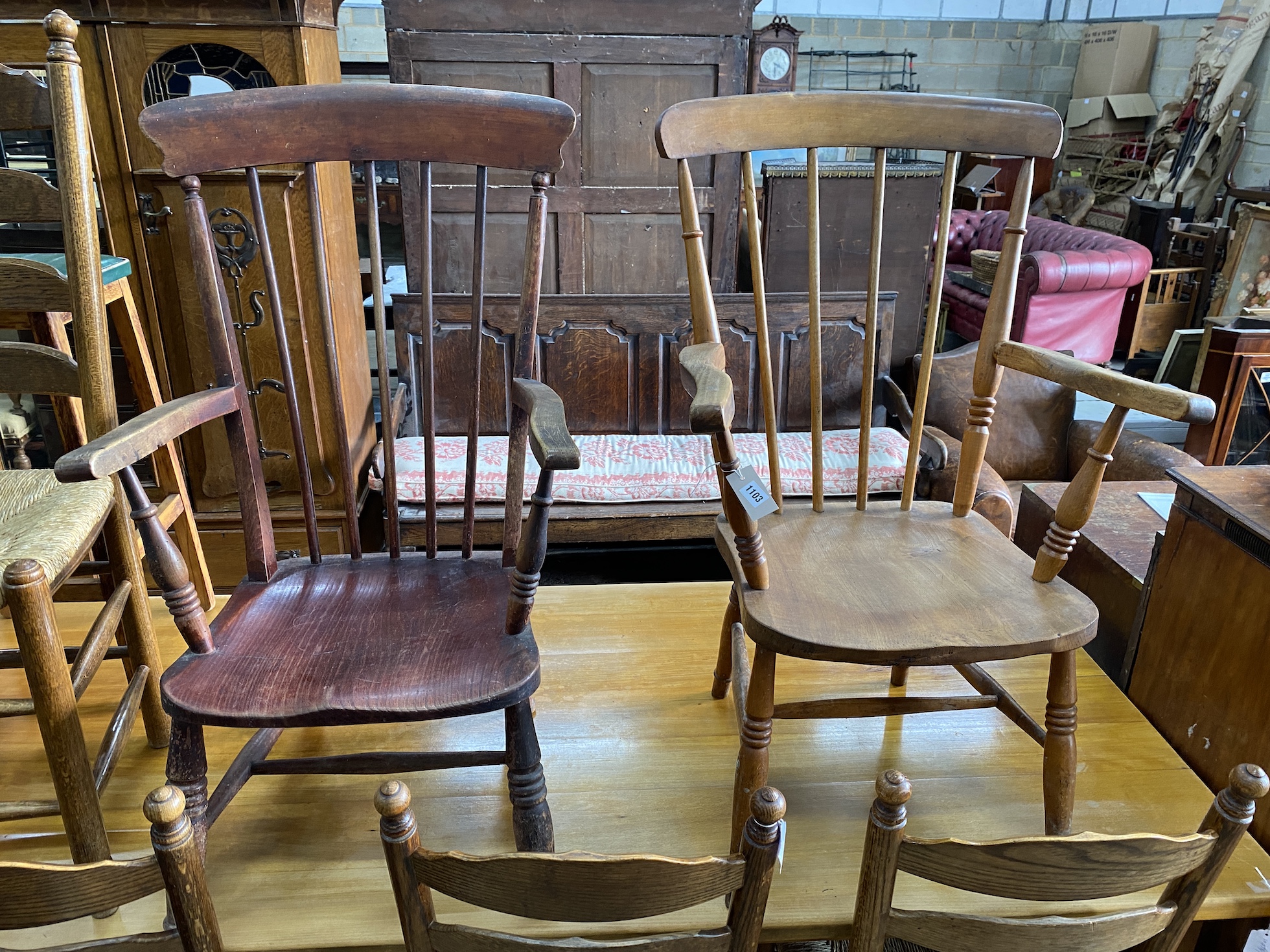 Two Victorian elm and beech Windsor comb back armchairs, larger width 60cm, depth 44cm, height 97cm